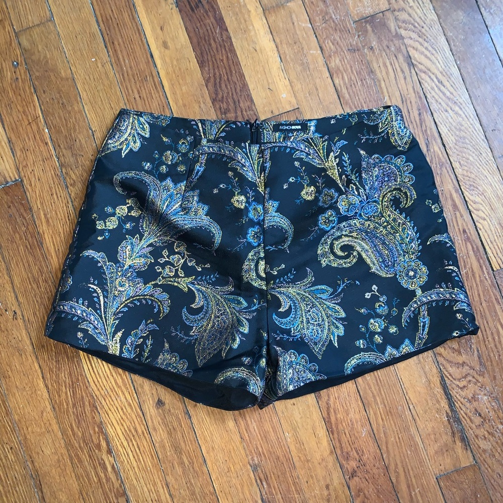 High-waisted black embroidered shorts, size 6
